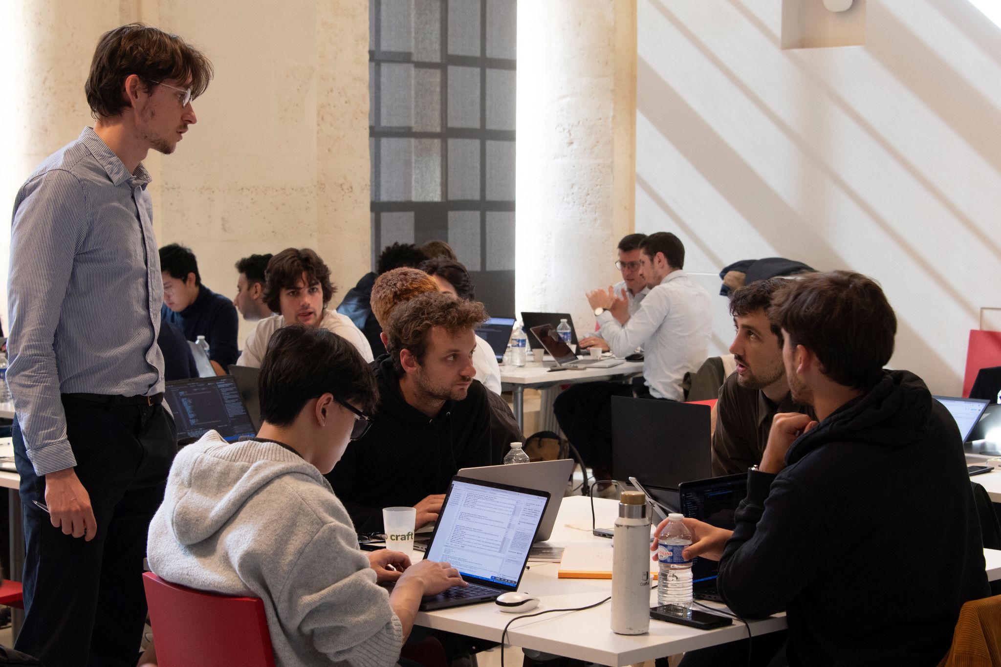 Team hacking at a table